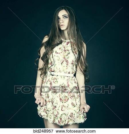 Stock Photo - Portrait of pensive Caucasian teenage girl looking away. Fotosearch