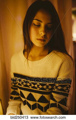 Stock Image - Portrait of pensive Caucasian woman. Fotosearch
