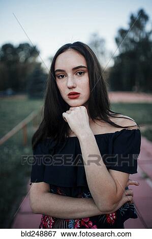 Stock Photo - Portrait of pensive Caucasian woman. Fotosearch
