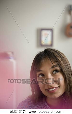 Portrait of pensive Mixed Race woman View Large Photo Image Picture - Portrait of pensive Mixed Race woman. Fotosearch