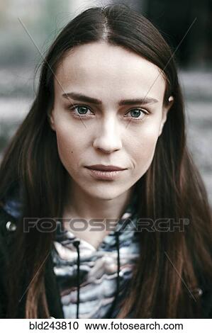 Stock Image - Portrait of serious Caucasian woman. Fotosearch