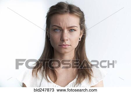 Stock Image - Portrait of serious Caucasian woman. Fotosearch