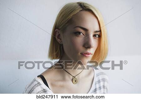 Portrait of serious Caucasian woman with short hair View Large Photo Image Stock Image - Portrait of serious Caucasian woman with short hair. Fotosearch