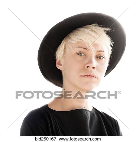 Portrait of serious Caucasian woman wearing hat View Large Photo Image Stock Photo - Portrait of serious Caucasian woman wearing hat. Fotosearch