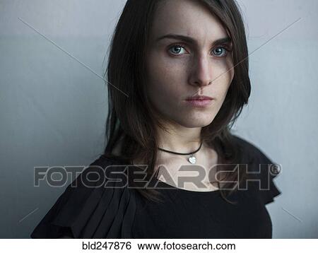Stock Photograph - Portrait of serious Caucasian woman. Fotosearch