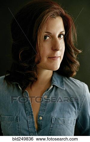 Stock Photograph - Portrait of serious Caucasian woman. Fotosearch