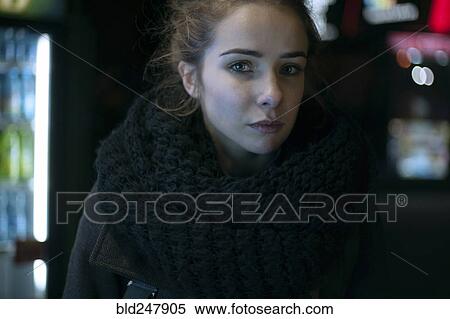 Portrait of serious Caucasian woman wearing scarf View Large Photo Image Stock Photography - Portrait of serious Caucasian woman wearing scarf. Fotosearch