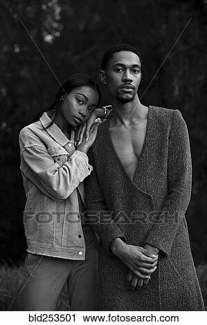 Stock Image - Portrait of serious couple. Fotosearch