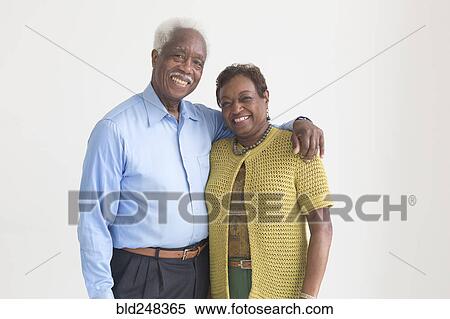Stock Photography - Portrait of smiling and older Black couple. Fotosearch