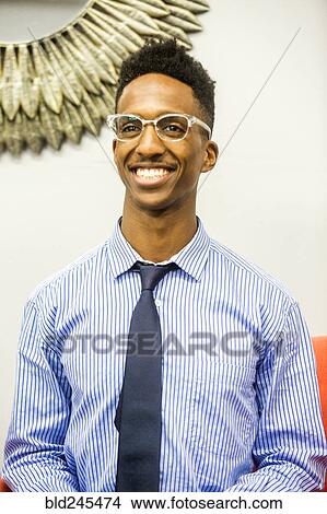 Picture - Portrait of smiling Black businessman. Fotosearch