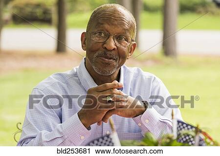 Portrait of smiling Black man View Large Photo Image Stock Image - Portrait of smiling Black man. Fotosearch