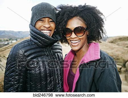 Stock Photo - Portrait of smiling Black women. Fotosearch