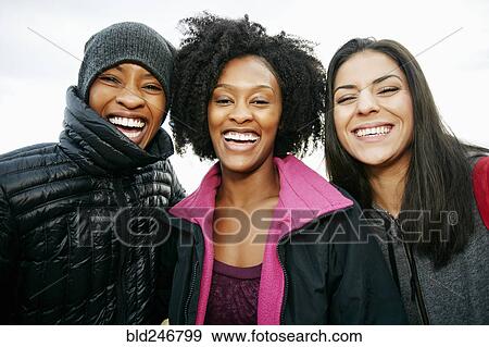 Stock Photo - Portrait of smiling Black women. Fotosearch