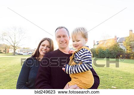 Stock Image - Portrait of smiling Caucasian family. Fotosearch