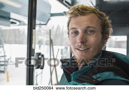 Picture - Portrait of smiling Caucasian man at winter resort. Fotosearch