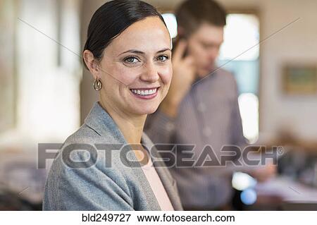 Portrait of smiling Caucasian businesswoman View Large Photo Image Stock Photo - Portrait of smiling Caucasian businesswoman. Fotosearch
