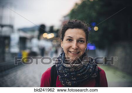 Portrait of smiling Caucasian woman wearing scarf View Large Photo Image Stock Image - Portrait of smiling Caucasian woman wearing scarf. Fotosearch