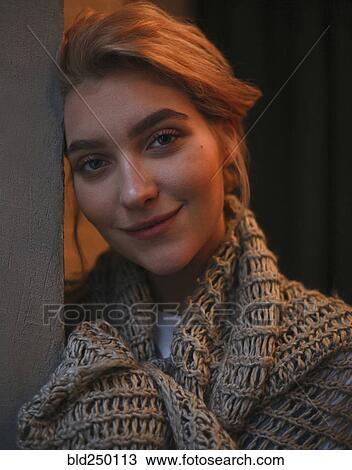 Portrait of smiling Caucasian woman wearing scarf View Large Photo Image Stock Image - Portrait of smiling Caucasian woman wearing scarf. Fotosearch
