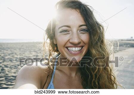 Stock Photo - Portrait of smiling Caucasian woman. Fotosearch