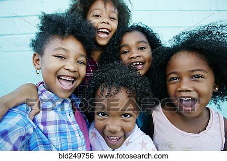Portrait of smiling girls View Large Photo Image Stock Photograph - Portrait of smiling girls. Fotosearch