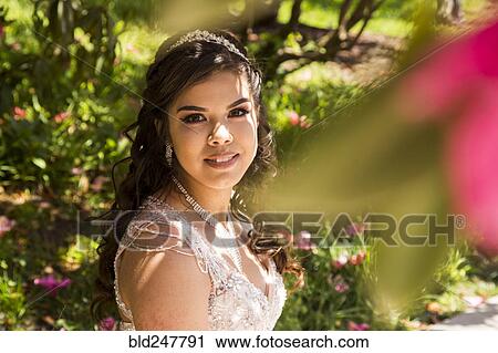 Stock Image - Portrait of smiling Hispanic girl. Fotosearch