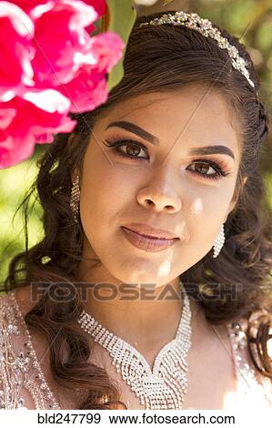 Stock Photo - Portrait of smiling Hispanic girl. Fotosearch