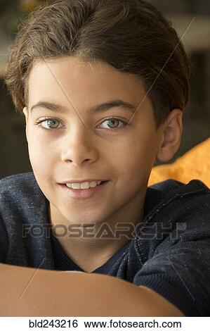 Portrait of smiling Mixed Race boy View Large Photo Image Stock Photograph - Portrait of smiling Mixed Race boy. Fotosearch