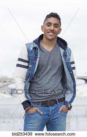 Stock Photo - Portrait of smiling Mixed Race man. Fotosearch
