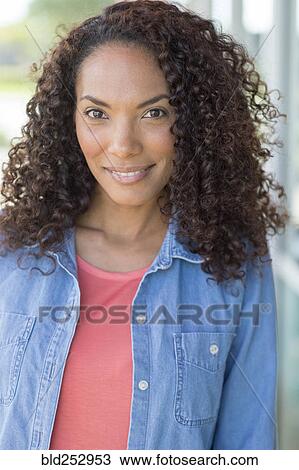 Portrait of smiling Mixed Race woman View Large Photo Image Stock Image - Portrait of smiling Mixed Race woman. Fotosearch