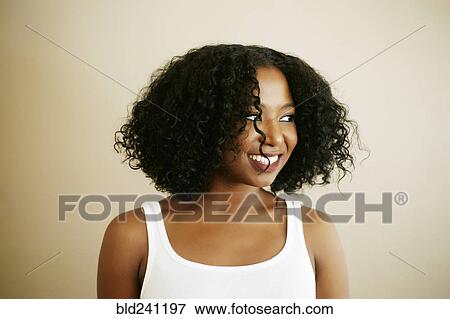 Portrait of smiling Mixed Race woman View Large Photo Image Stock Photo - Portrait of smiling Mixed Race woman. Fotosearch