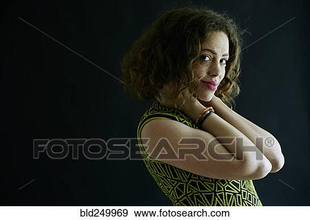 Stock Photo - Portrait of smiling Mixed Race woman. Fotosearch