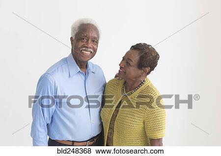 Stock Photo - Portrait of smiling older Black couple. Fotosearch