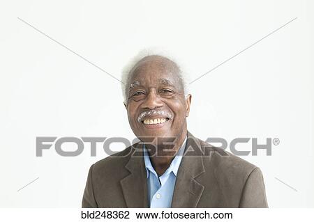 Stock Image - Portrait of smiling older Black man. Fotosearch