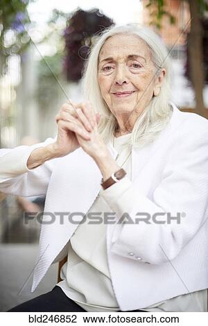 Portrait of smiling older Caucasian woman View Large Photo Image Stock Image - Portrait of smiling older Caucasian woman. Fotosearch