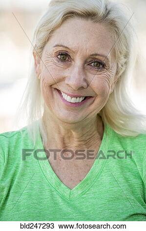 Stock Image - Portrait of smiling Older Caucasian woman. Fotosearch