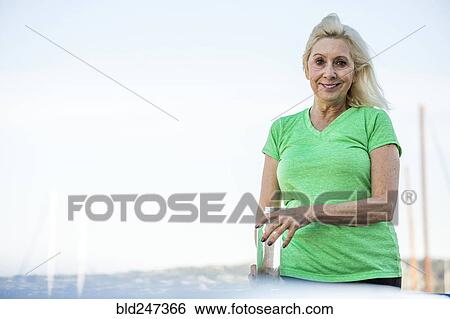 Portrait of smiling older Caucasian woman View Large Photo Image Stock Photograph - Portrait of smiling older Caucasian woman. Fotosearch