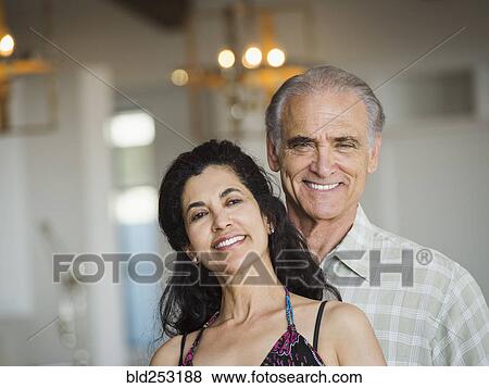 Stock Photo - Portrait of smiling older couple. Fotosearch