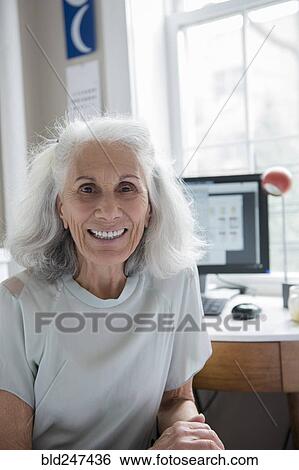 Portrait of smiling older woman View Large Photo Image Stock Photograph - Portrait of smiling older woman. Fotosearch