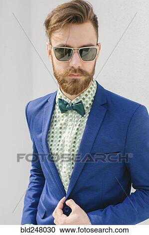 Stock Image - Portrait of stylish Middle Eastern man with beard. Fotosearch