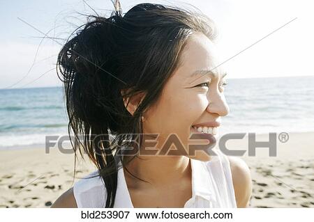 Portrait of Vietnamese woman at beach smiling View Large Photo Image Stock Photo - Portrait of Vietnamese woman at beach smiling. Fotosearch