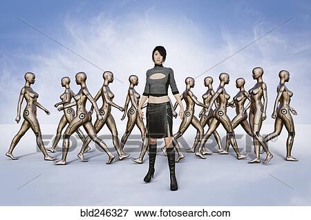 Stock Photo - Portrait of woman standing in front of walking robots. Fotosearch