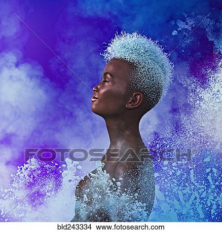 Picture - Powder splashing n futuristic woman. Fotosearch