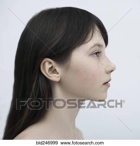 Profile of Caucasian girl with long hair View Large Photo Image Stock Photo - Profile of Caucasian girl with long hair. Fotosearch