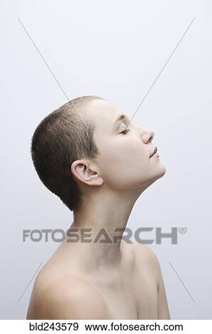 Profile of Caucasian woman with shaved-head View Large Photo Image Stock Photo - Profile of Caucasian woman with shaved-head. Fotosearch