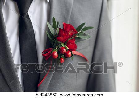 Red corsage on suit jacket View Large Photo Image Stock Image - Red corsage on suit jacket. Fotosearch