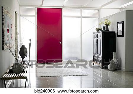 Stock Photograph - Red door in foyer. Fotosearch