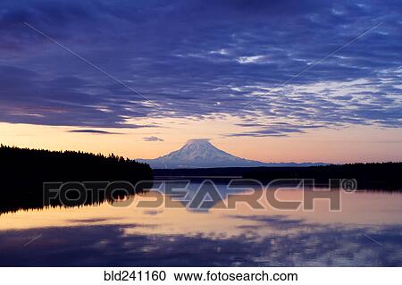 Reflection of clouds and mountain in river at sunset View Large Photo Image Stock Image - Reflection of clouds and mountain in river at sunset. Fotosearch