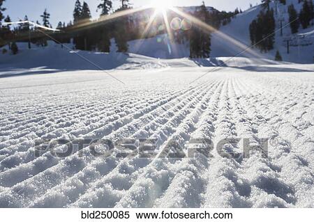Stock Photography - Ridges in snow covered field. Fotosearch
