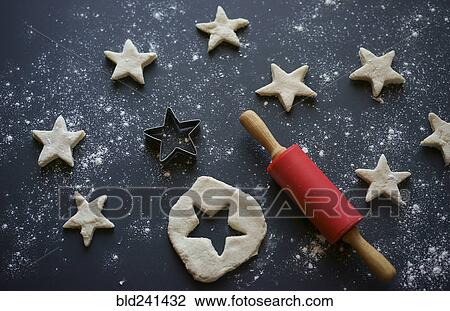 Rolling pin and star-shaped pastry cutter for cookies View Large Photo Image Stock Image - Rolling pin and star-shaped pastry cutter for cookies. Fotosearch