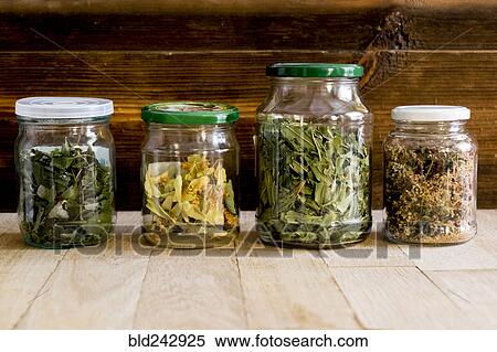 Row of jars of tea leaves View Large Photo Image Stock Photography - Row of jars of tea leaves. Fotosearch